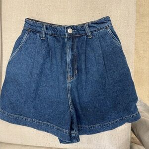Reformation high waisted pleated jean shorts